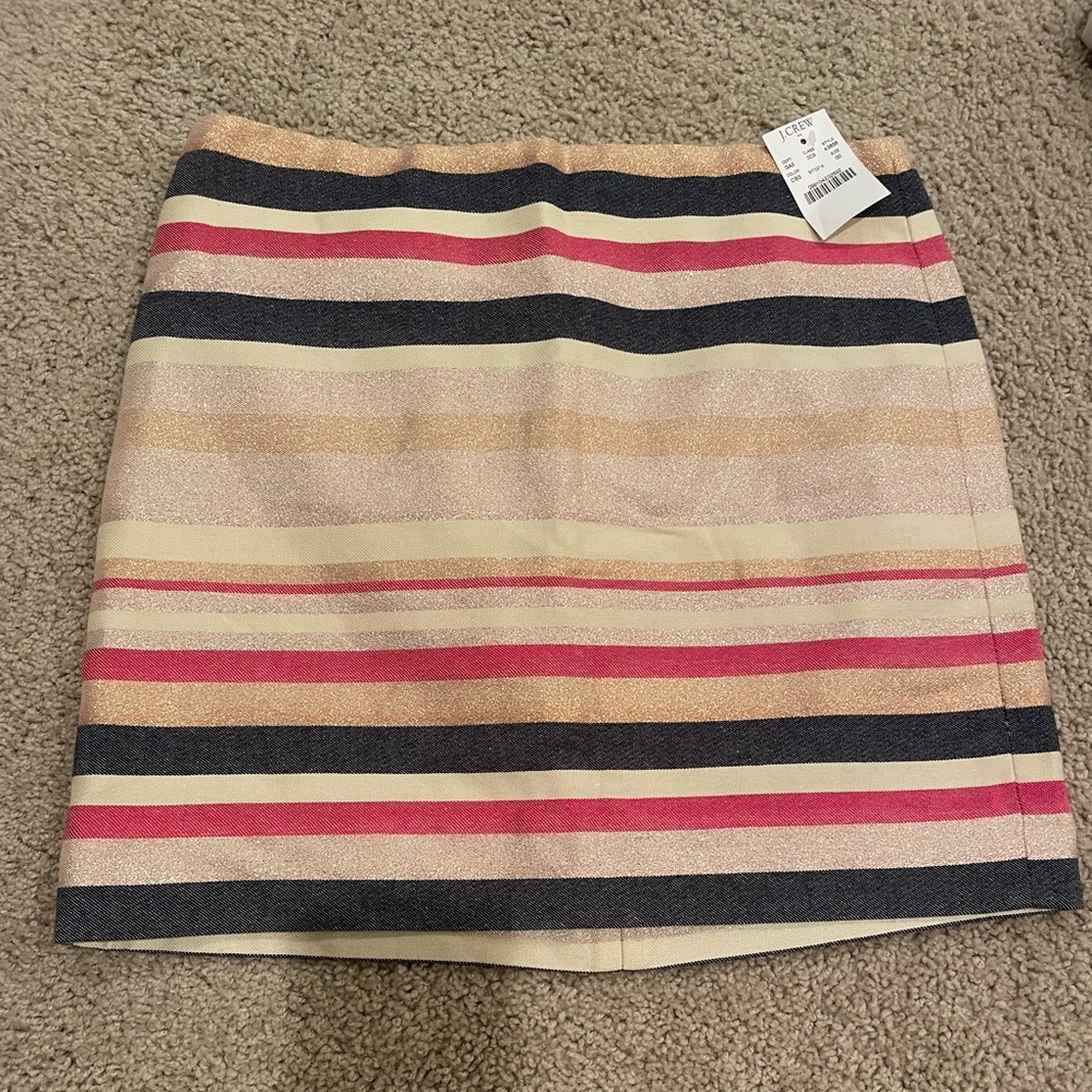 BNWT!! brand new with the tags !! J CREW skirt that is perfect for a party !!